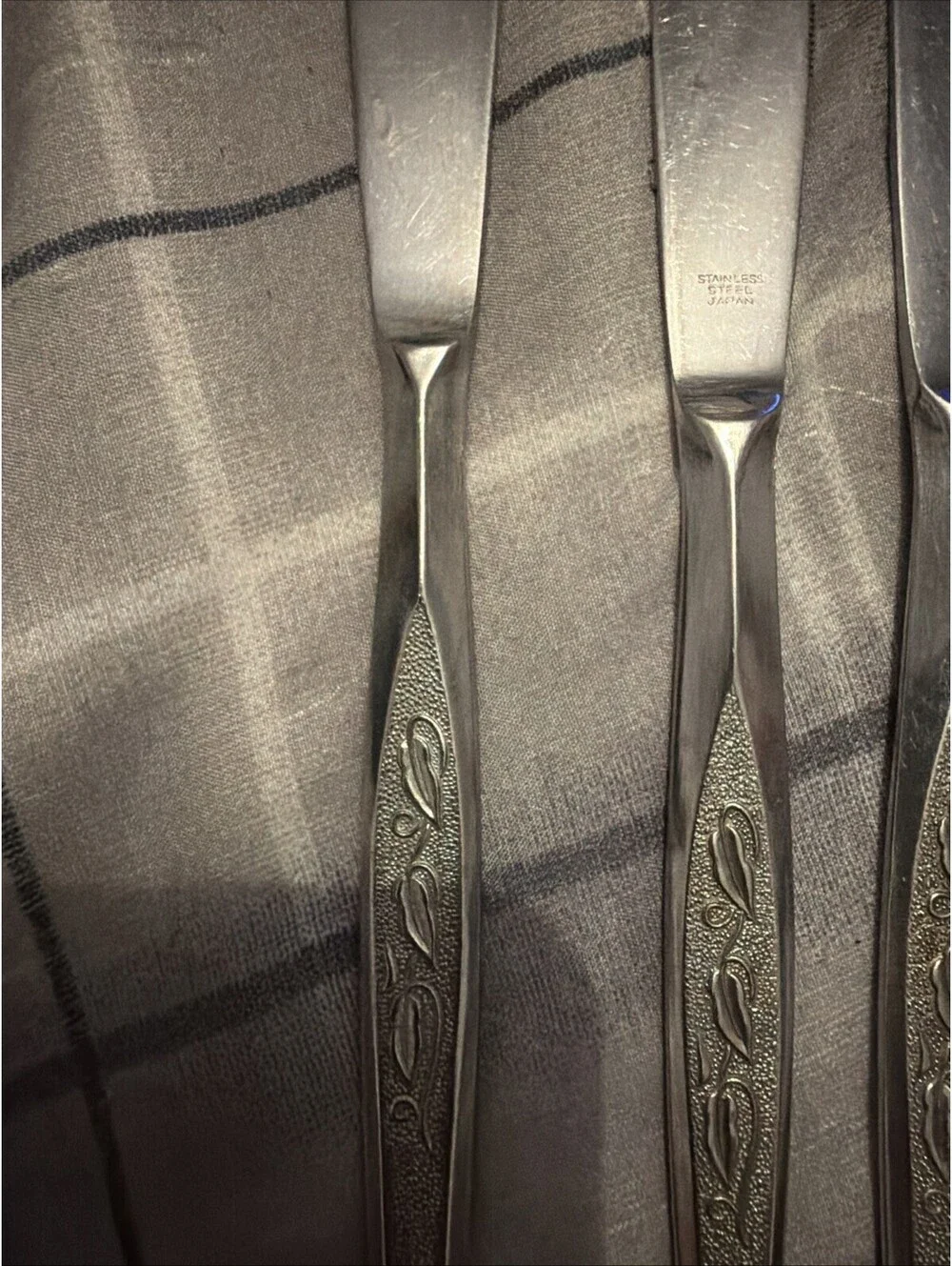 Lot Of 4 Unbranded stainless Japan flatware Woodmere pattern.